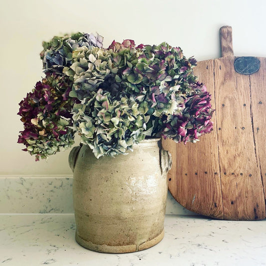 confit pot, vintage decor, antiques in the home and kitchen, decorating with antiques, antique breadboard and decor in the home, styling with dried flowers, styling the seasons, antiques adding depth and value to your home and interior