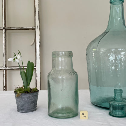 VINTAGE AQUA GLASS BOTTLES